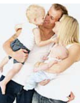 family where father is holding or protecting woman and children